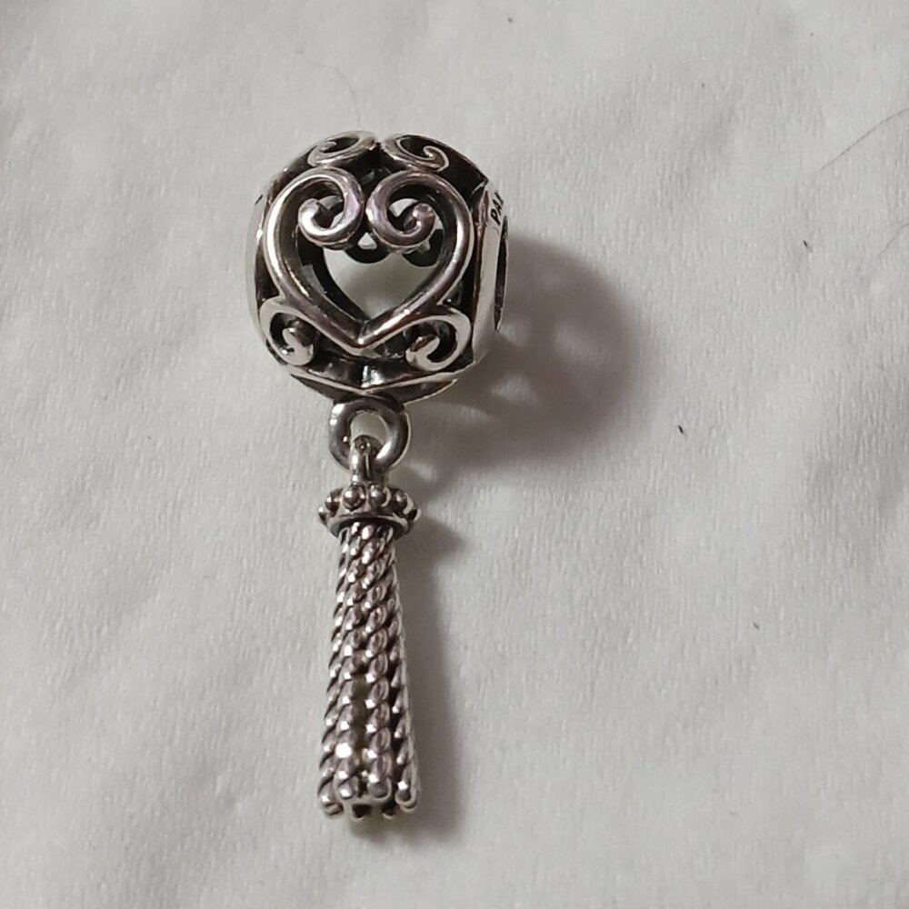 Pandora dangle heart tassel charm.